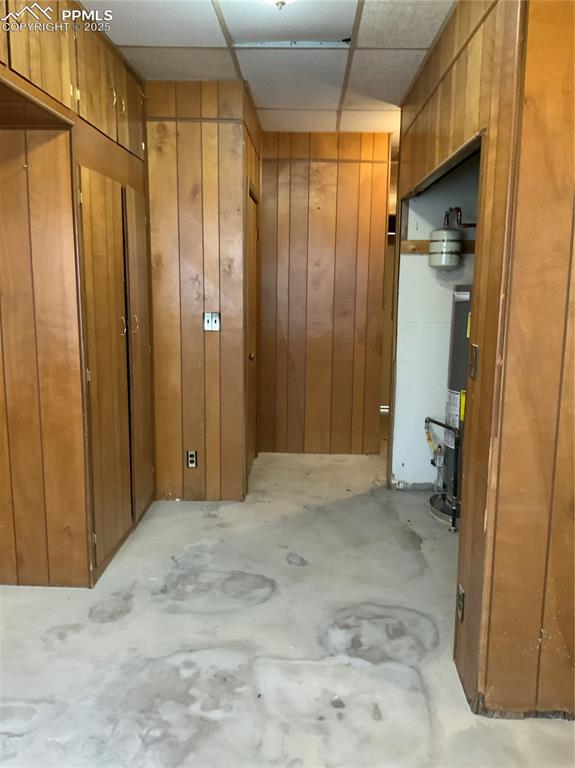 Image 29 of 39: Mechanical room/laundry room or craft room/ TV room