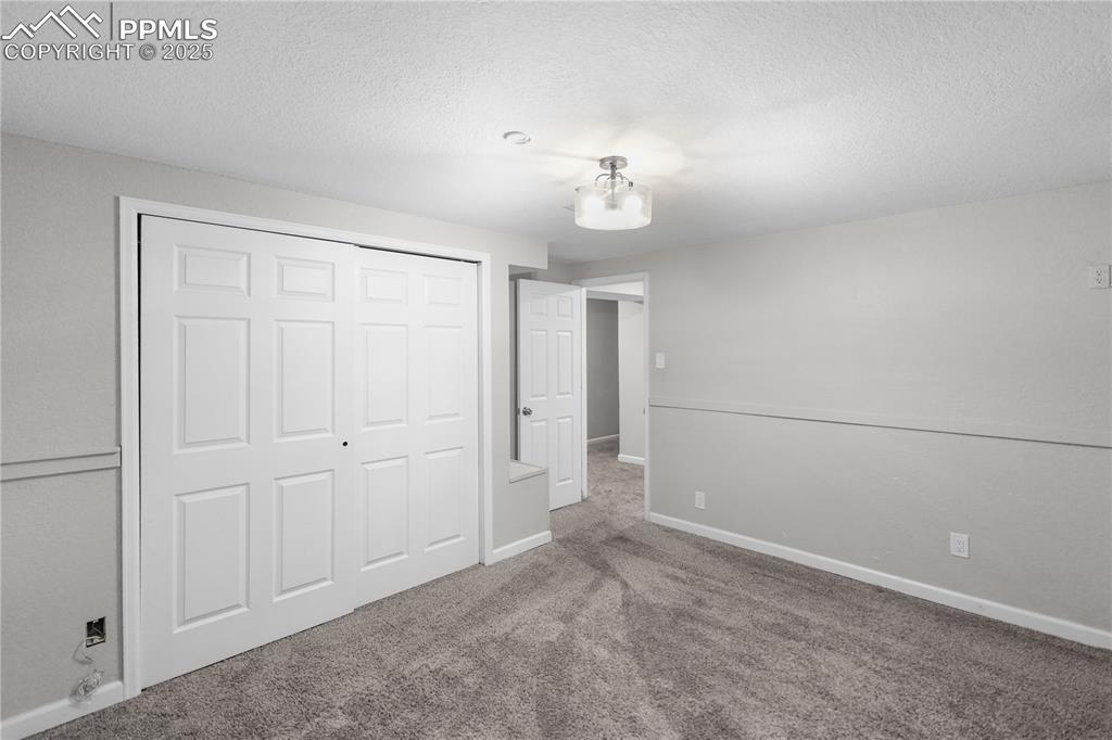 Image 33 of 38: Bedroom