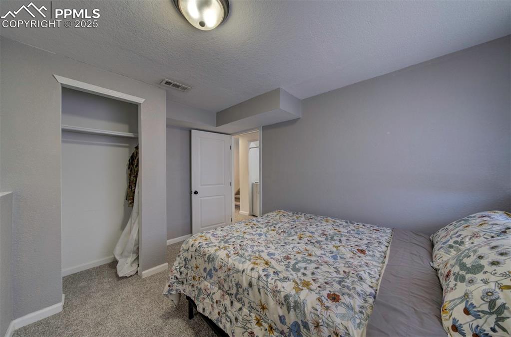 Image 26 of 34: Bedroom