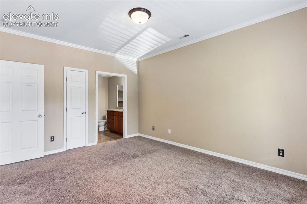 Image 18 of 31: Master Bedroom