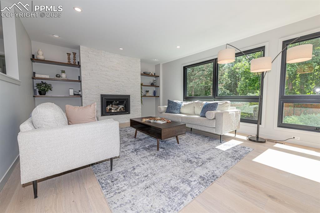 Image 12 of 50: Bright metal clad wood windows throughout