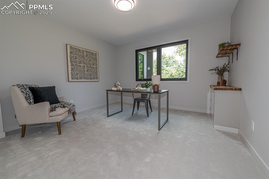 Image 25 of 50: Second main level bedroom or office