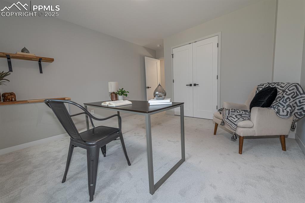 Image 26 of 50: Second main level bedroom or office