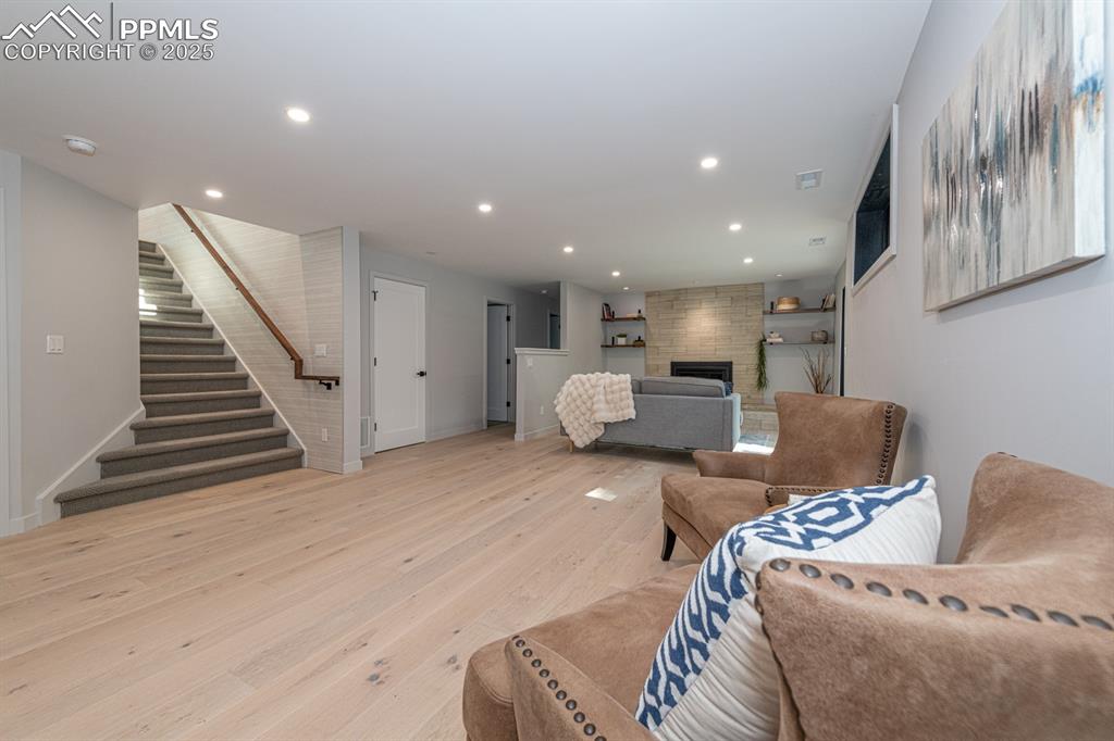 Image 29 of 50: Large basement rec room with walk out