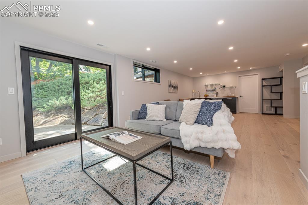 Image 32 of 50: Basement family room with walk out