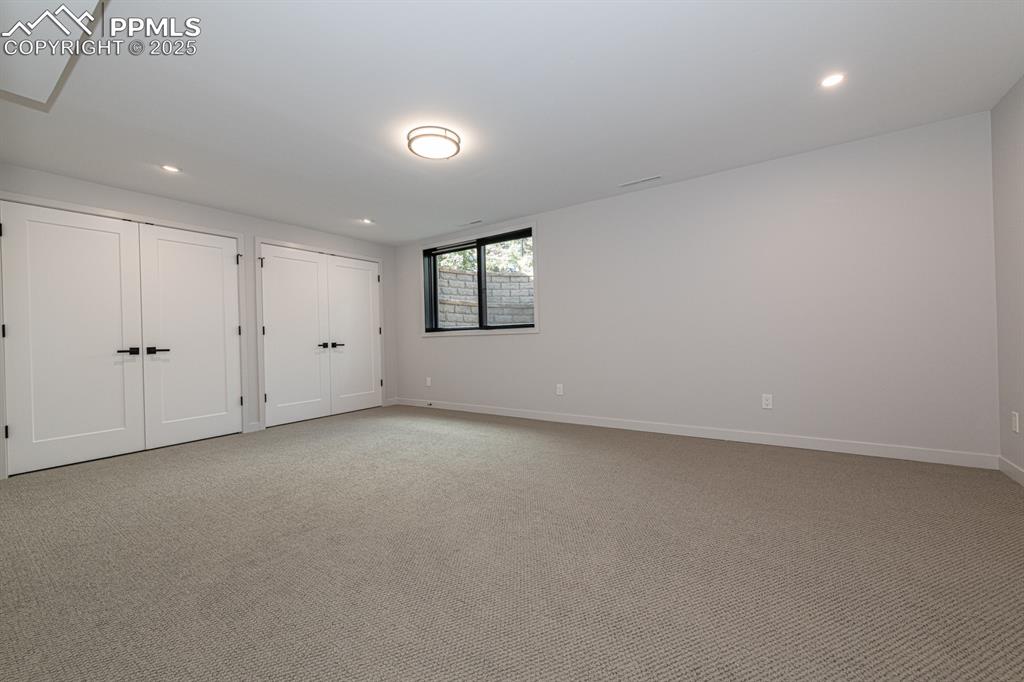 Image 34 of 50: Huge basement bedroom would make a great gym