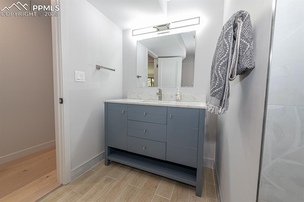 Image 35 of 50: Basement full bath with custom appointments