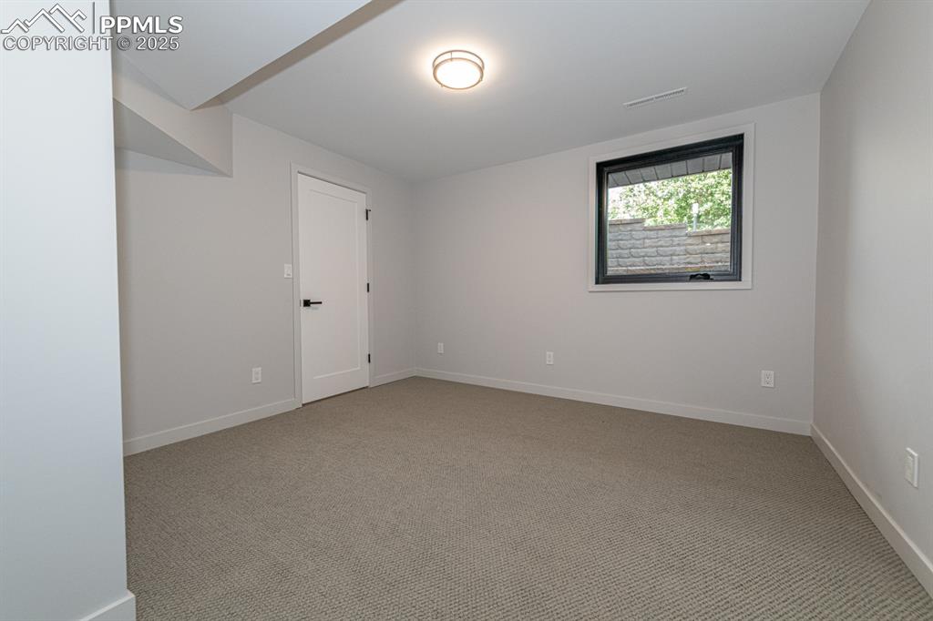 Image 37 of 50: Basement bedroom or second office