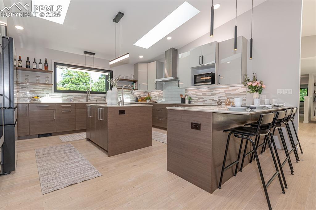 Image 7 of 50: Gourmet kitchen with tons of cabinetry