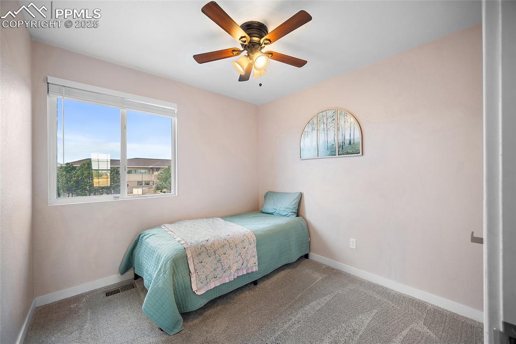 Image 24 of 36: Bedroom