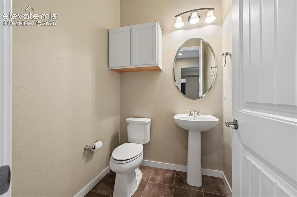 Image 14 of 49: Half bath on main