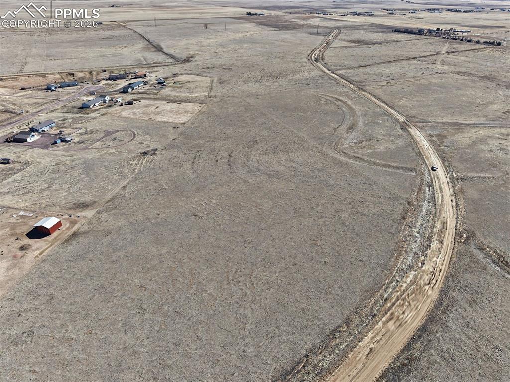 Image 5 of 11: Community & Road Access View
Aerial view demonstrating established neighbo