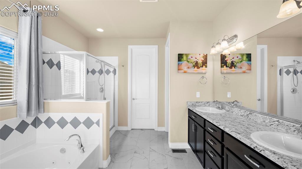 Image 21 of 40: Master Bathroom