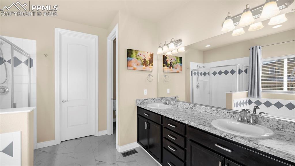 Image 22 of 40: Master Bathroom