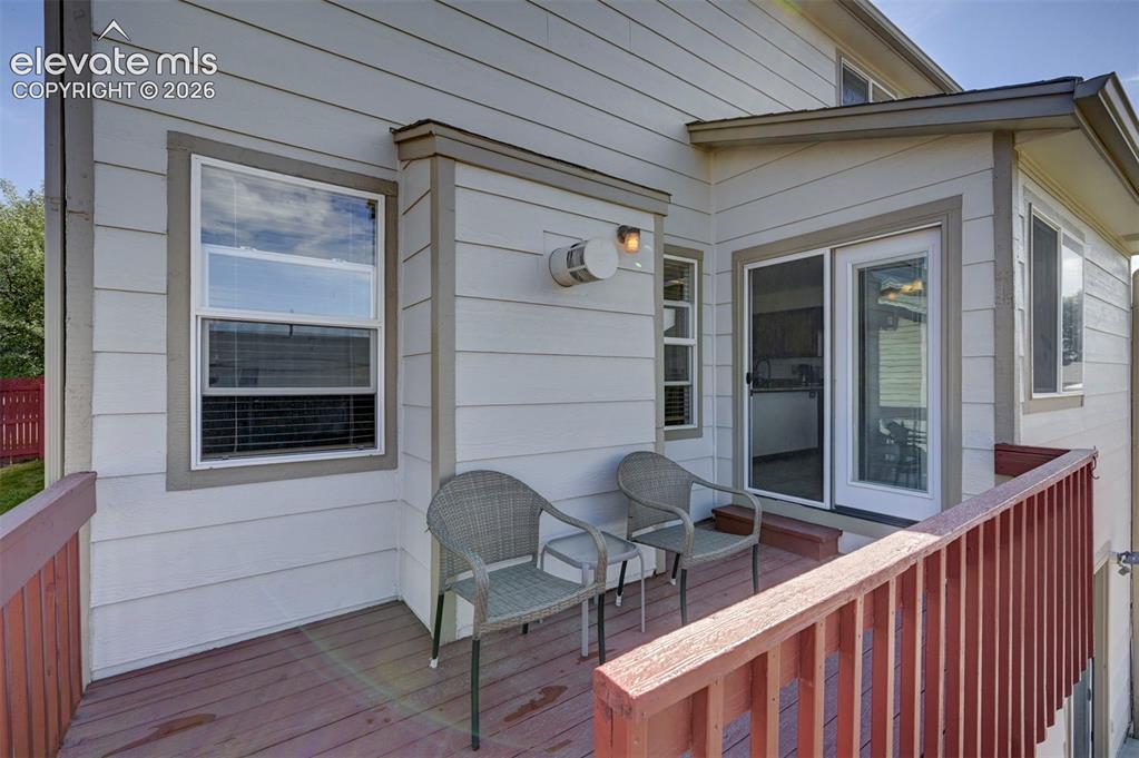 Image 14 of 50: Seating area on the deck.