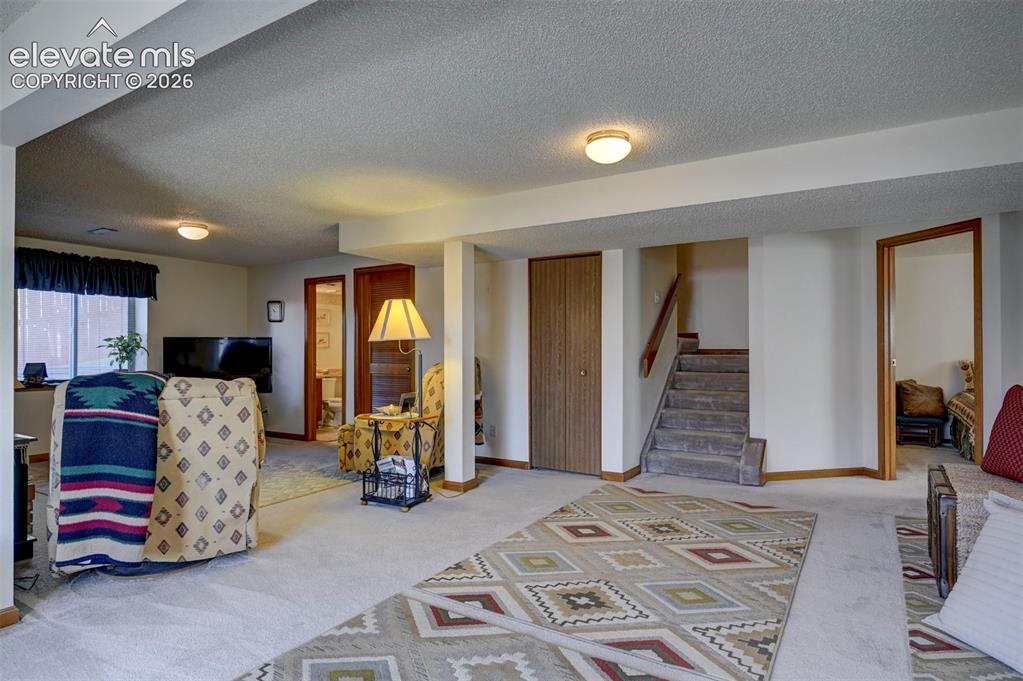 Image 33 of 50: Spacious basement with second family room and area for game room, gym or pl