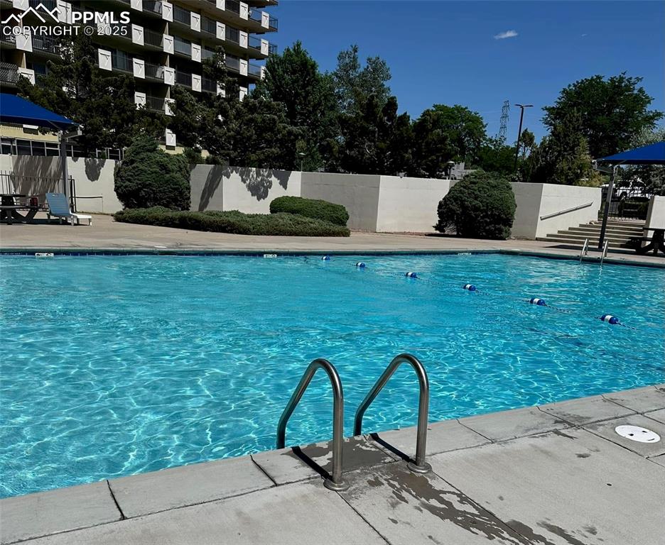 Image 41 of 41: The pool area in summer