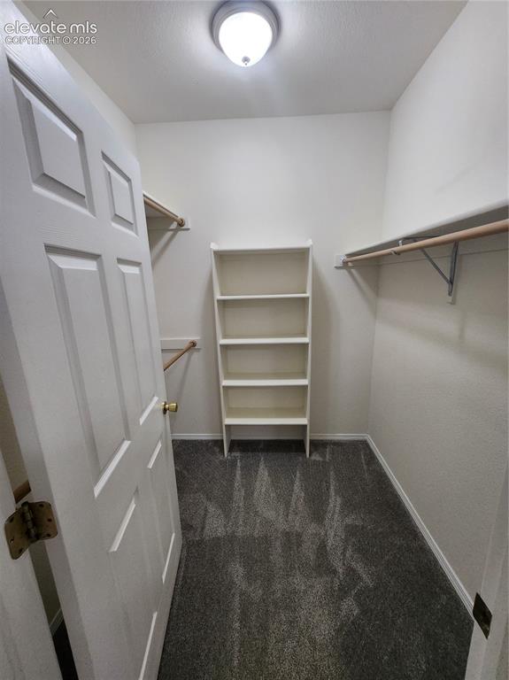 Image 14 of 28: Primary Closet