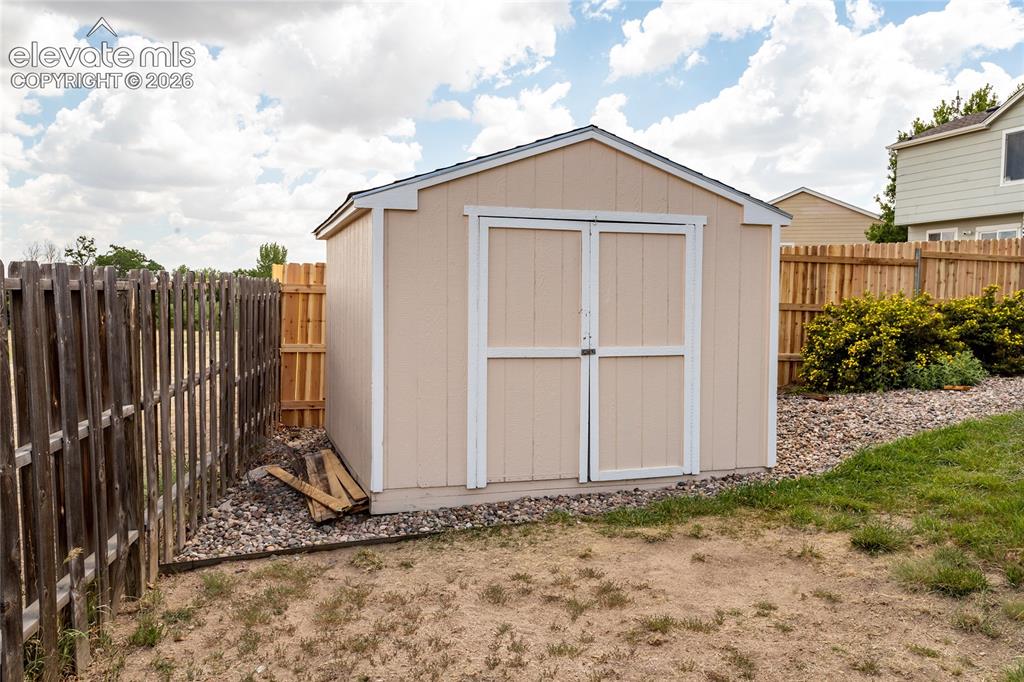 Image 41 of 49: Good sized Storage Shed. 