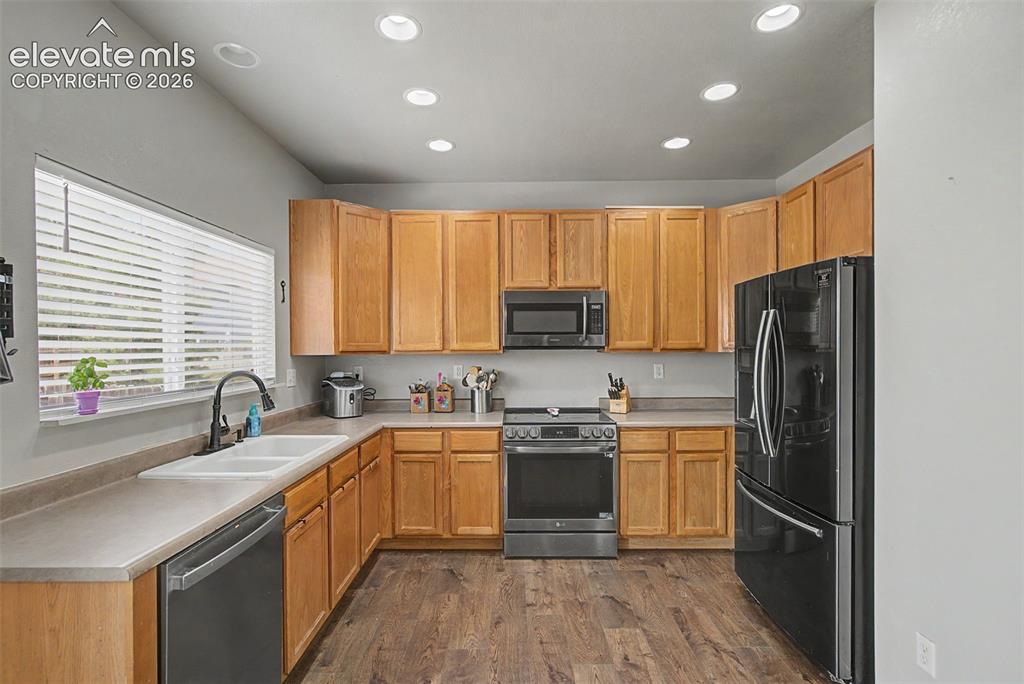 Image 12 of 28: Functional Kitchen with Ample Counter Space