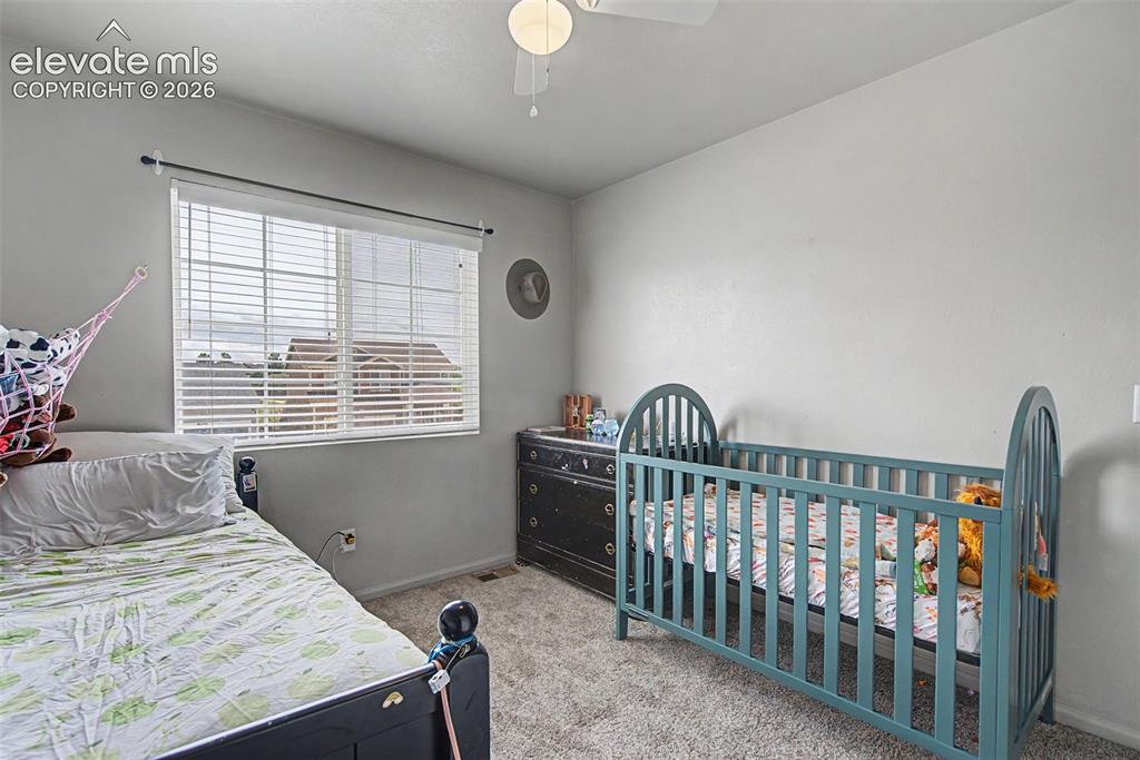 Image 19 of 28: Bright Upstairs Secondary Bedroom