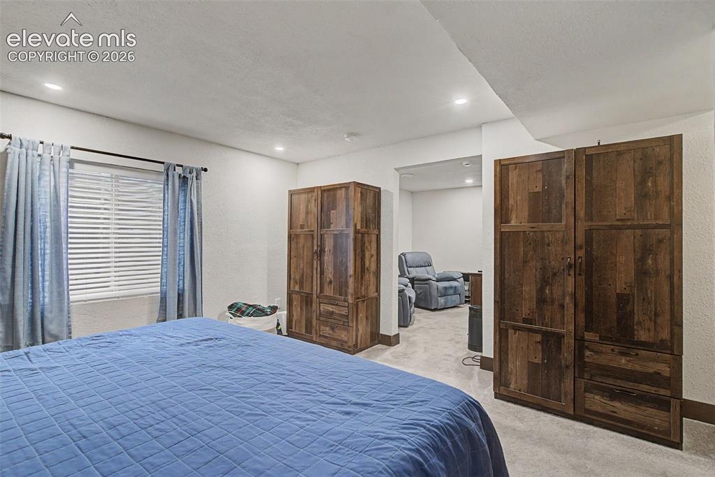 Image 23 of 28: Spacious Basement Bedroom