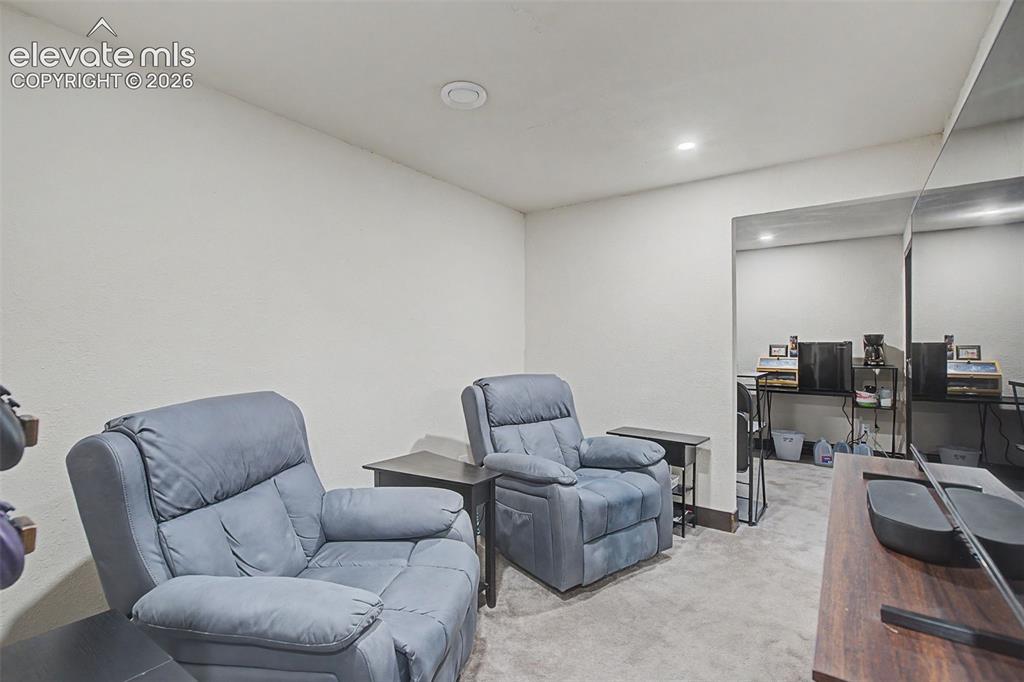 Image 24 of 28: Private Sitting Area off Basement Bedroom