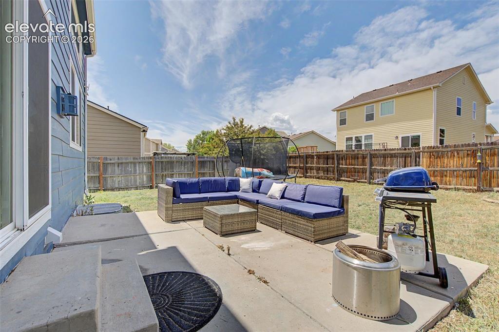 Image 27 of 28: Back Patio for Outdoor Living