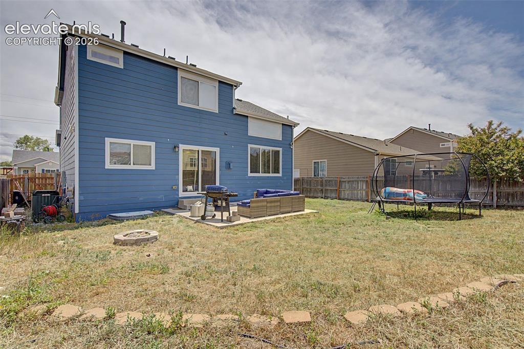Image 28 of 28: Fenced Backyard & Rear Exterior