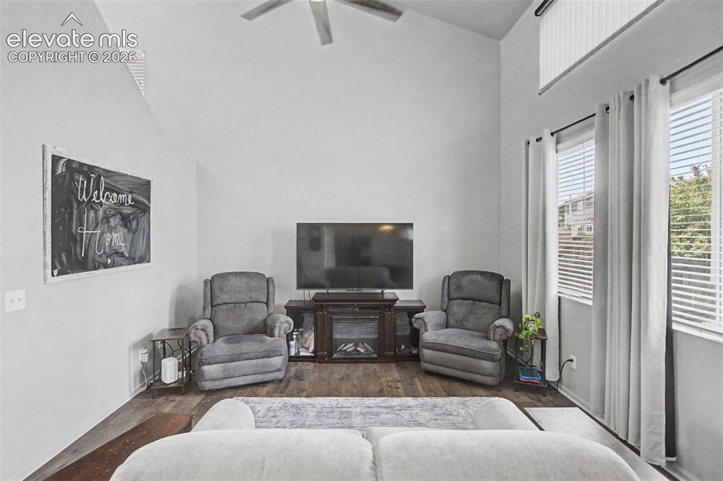 Image 3 of 28: Spacious Living Room with Large Pictures Windows