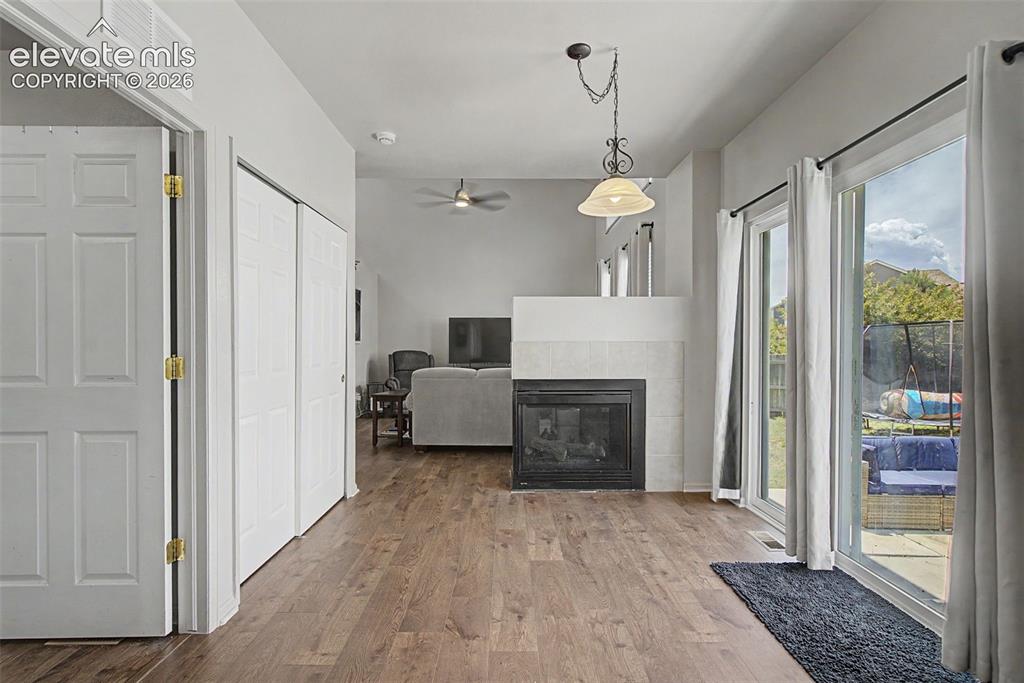 Image 8 of 28: Dining Area with Backyard Access