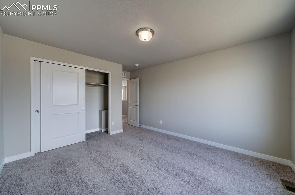 Image 28 of 33: Bedroom