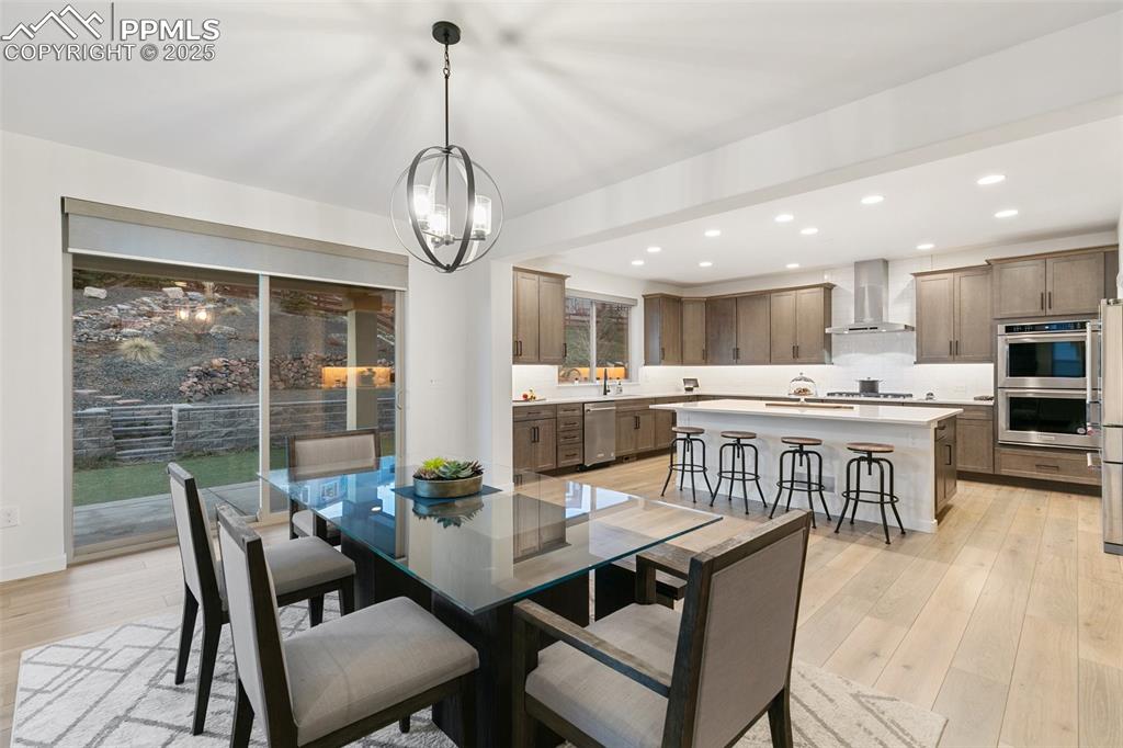 Image 11 of 49: Dining area walks-out to patio