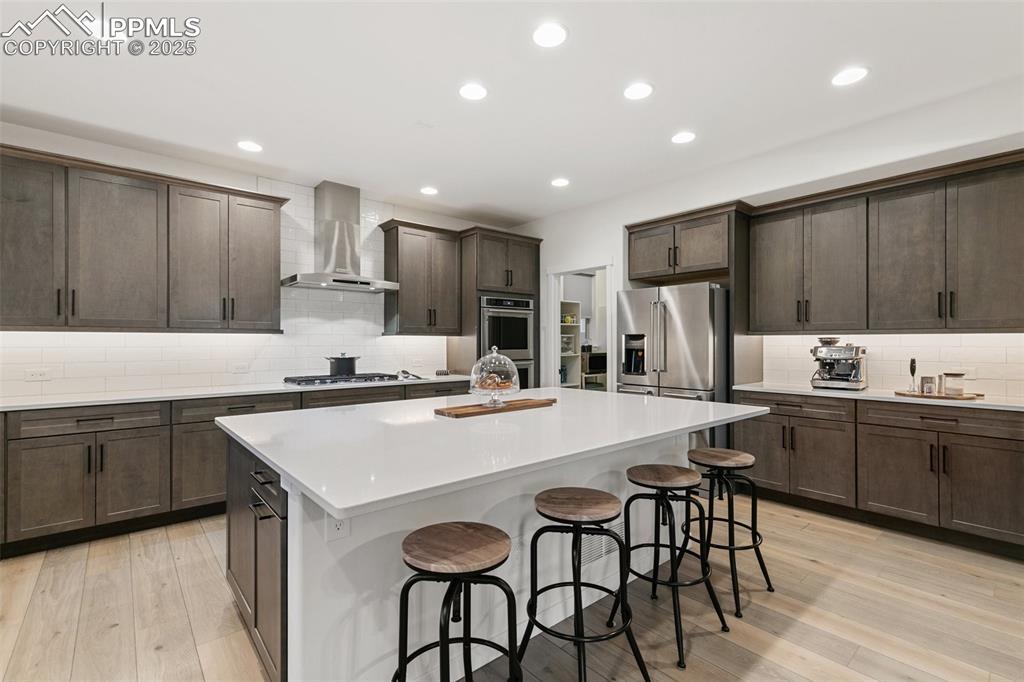 Image 13 of 49: Beautifully designed gourmet kitchen