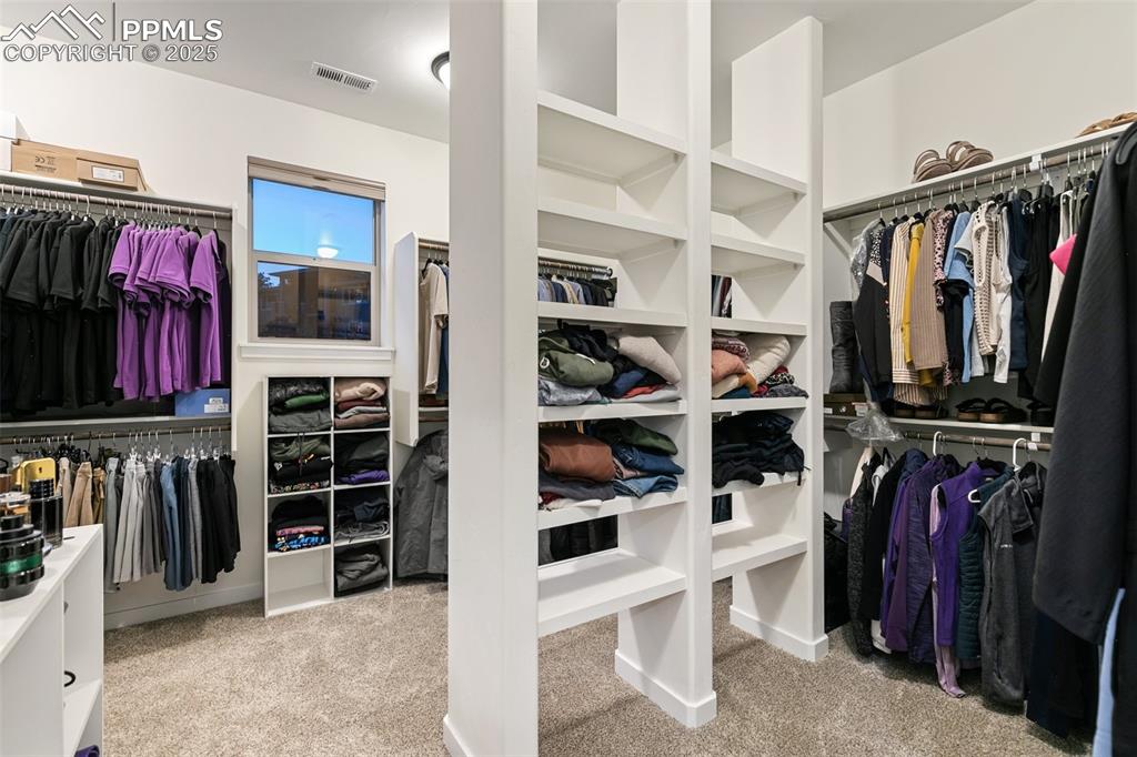 Image 28 of 49: HUGE walk-in closet