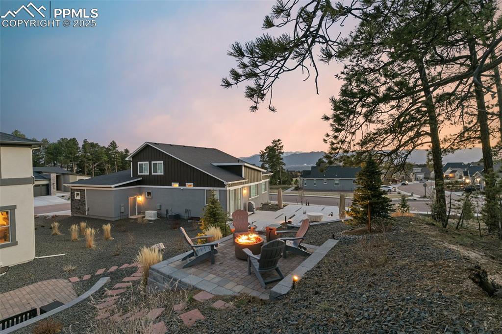 Image 46 of 49: Outdoor firepit and front range views