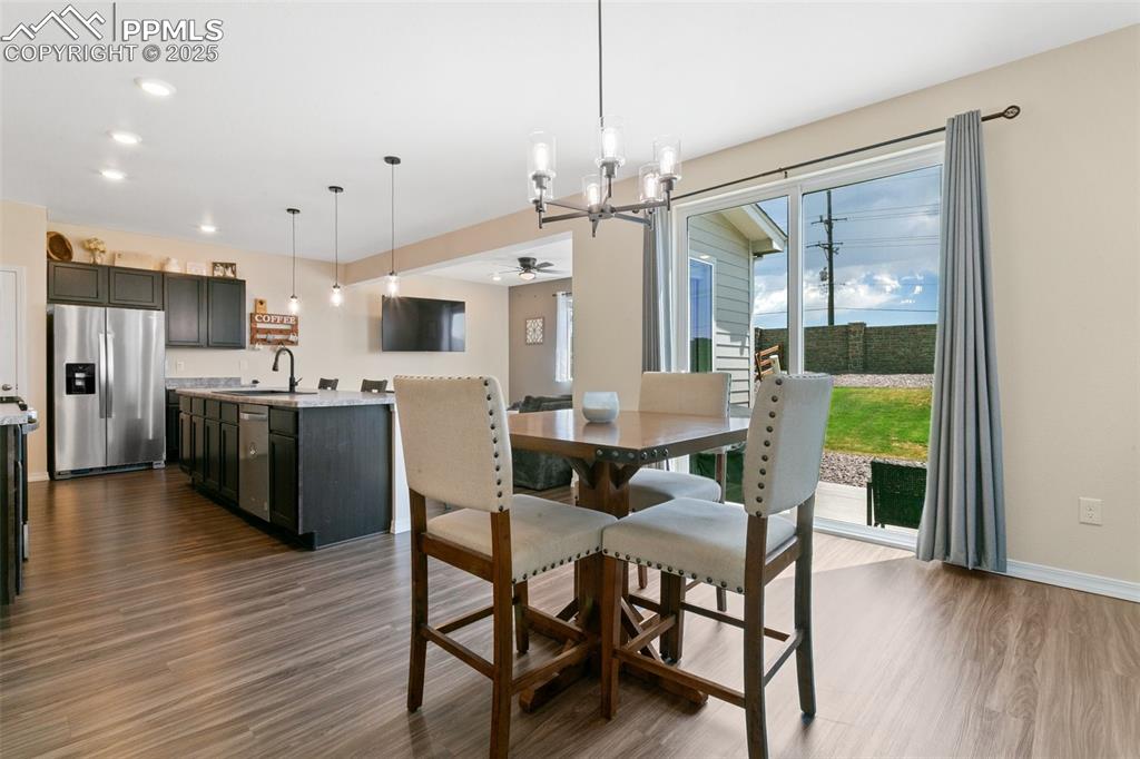 Image 19 of 37: Dining room with walk-out