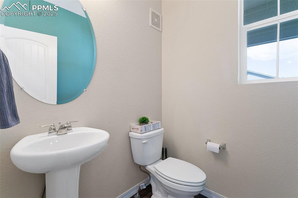 Image 21 of 37: 1/2 bath on main floor 