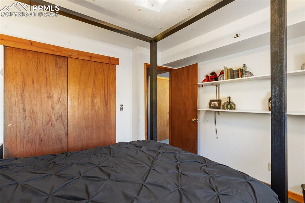 Image 18 of 42: Lower level bedroom