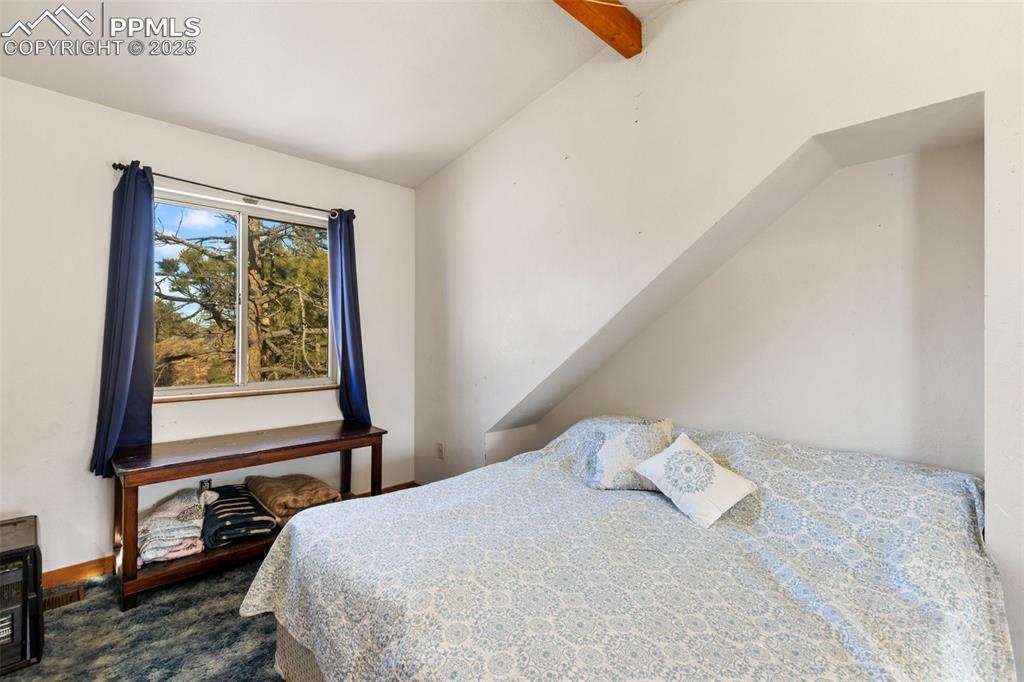 Image 25 of 42: Upper level bedroom