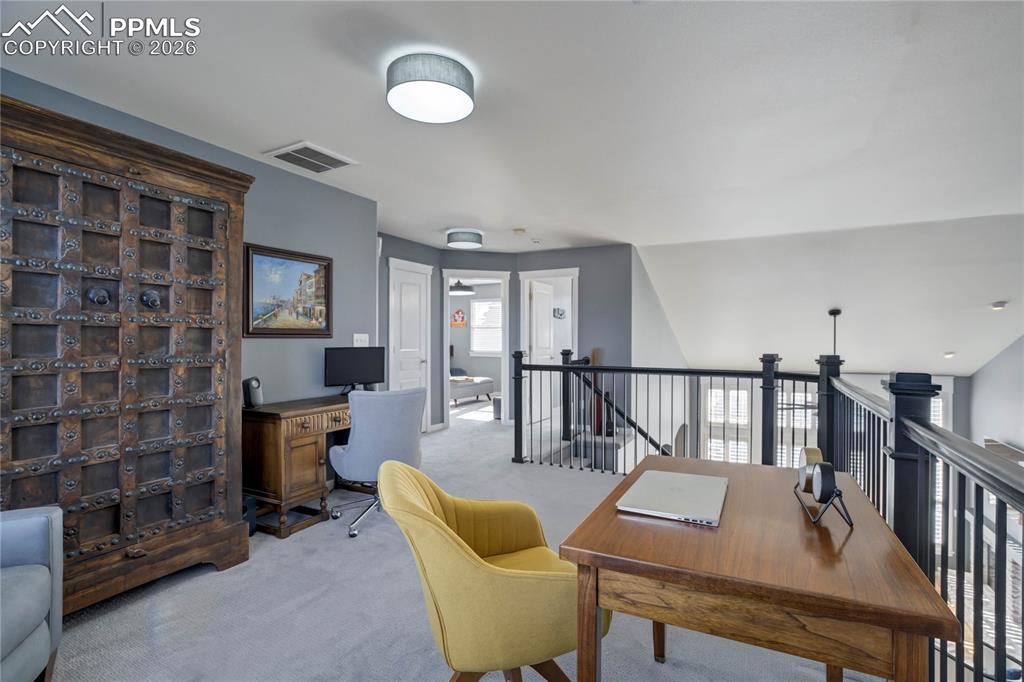 Image 30 of 50: Upper level loft.