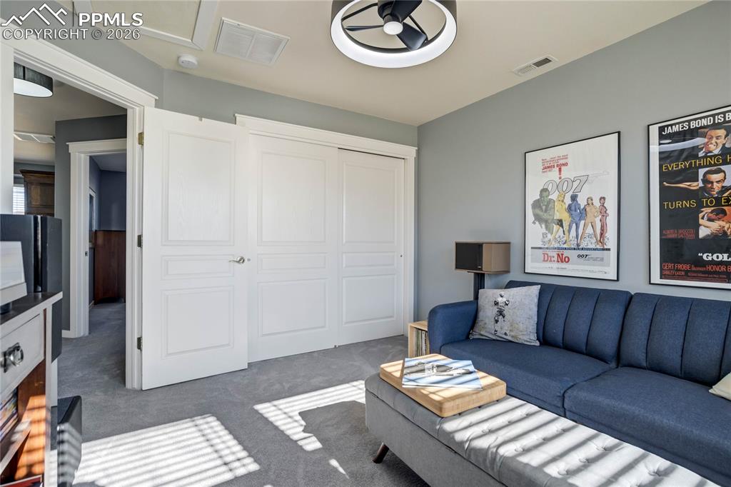 Image 32 of 50: Upper level bedroom.