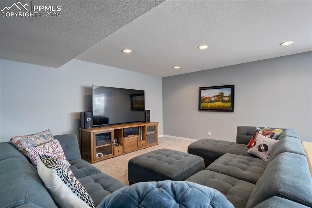 Image 37 of 50: Lower level family room.