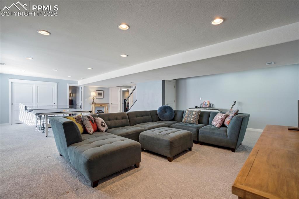 Image 38 of 50: Lower level family room.