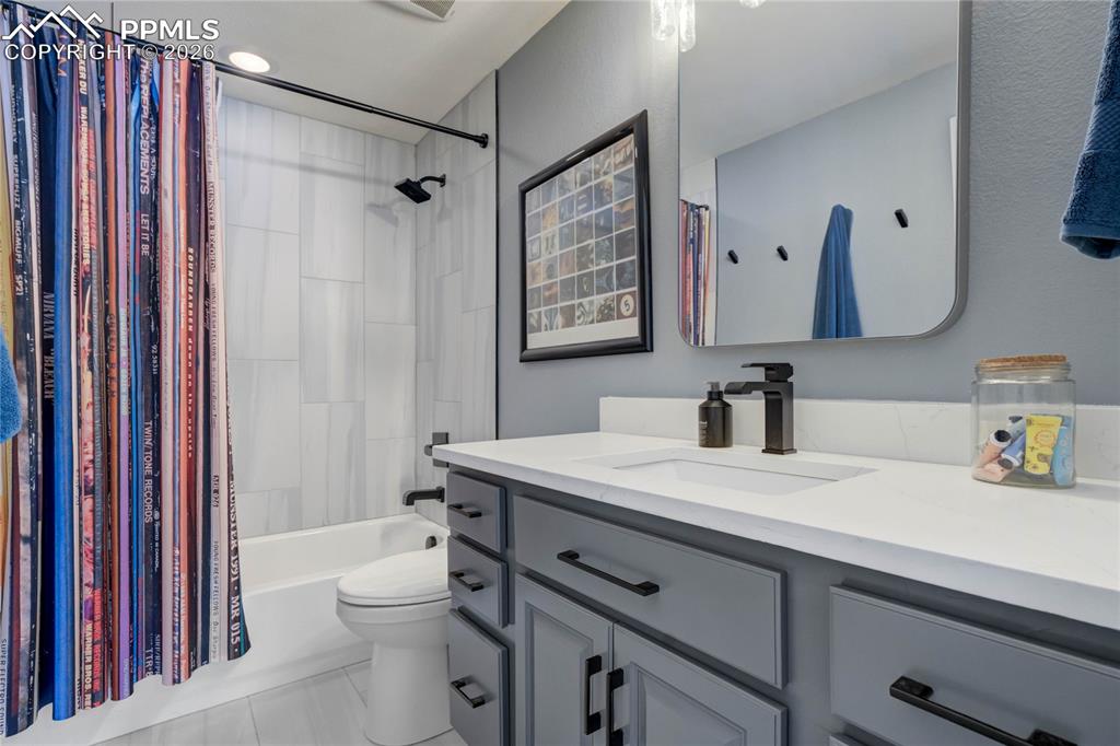 Image 44 of 50: Lower level full bathroom.