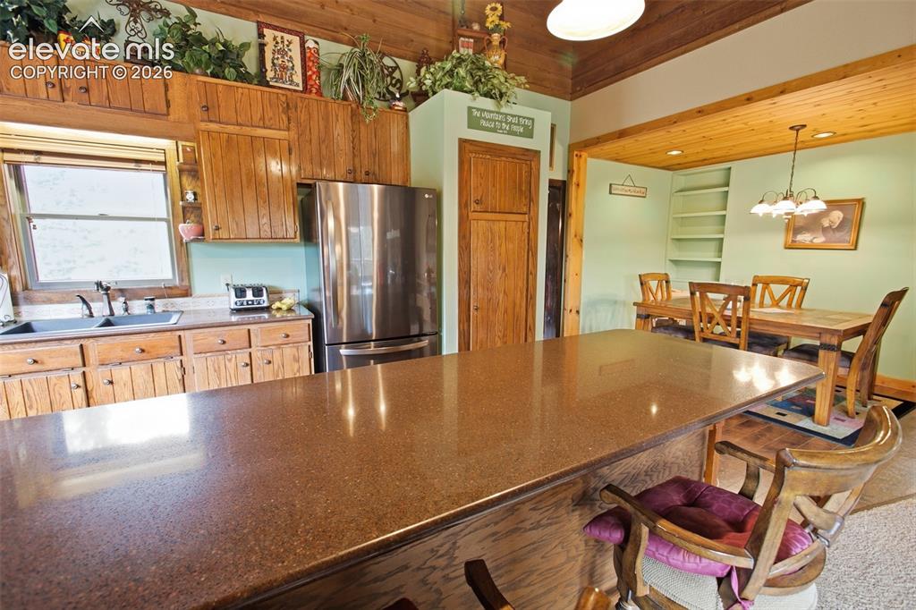 Image 7 of 34: Kitchen & Dining