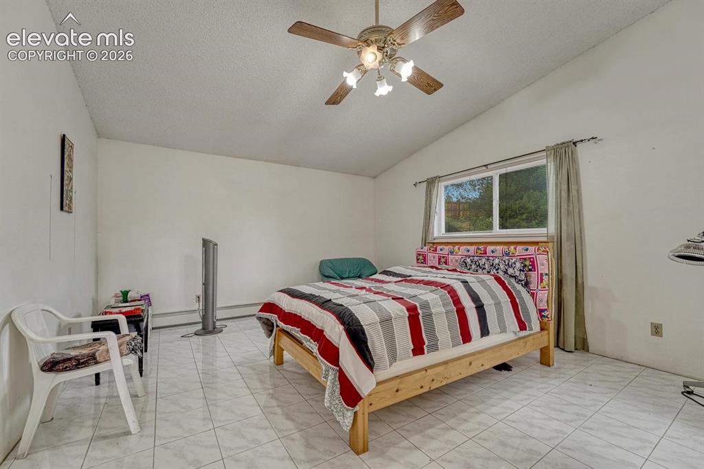 Image 19 of 50: Master Bedroom