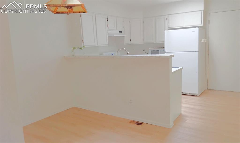 Image 8 of 13: kitchen/dining room