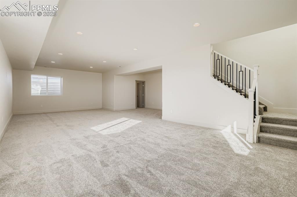 Image 16 of 41: Finished basement family/rec room expands your living space—perfect for mov