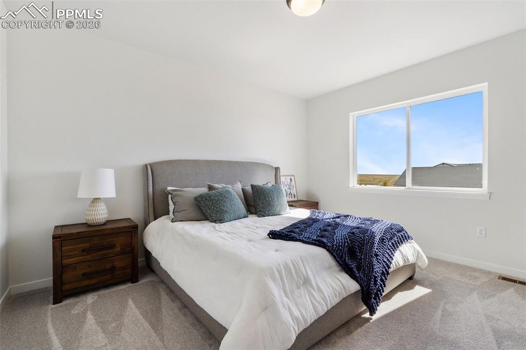 Image 10 of 13: Master Bedroom